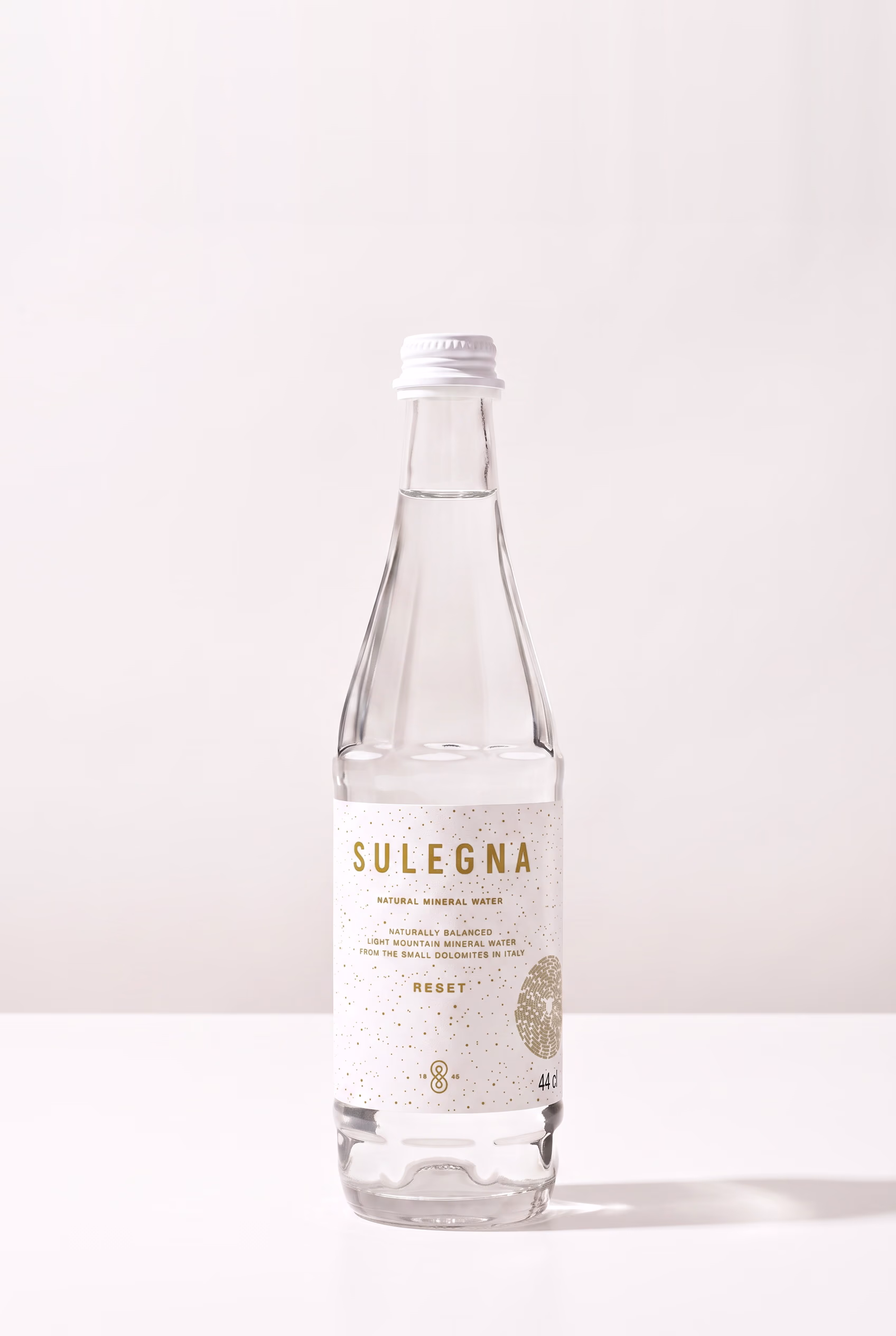 SULEGNA Reset 44 cl bottle on white with the circular numbers emblem on the label